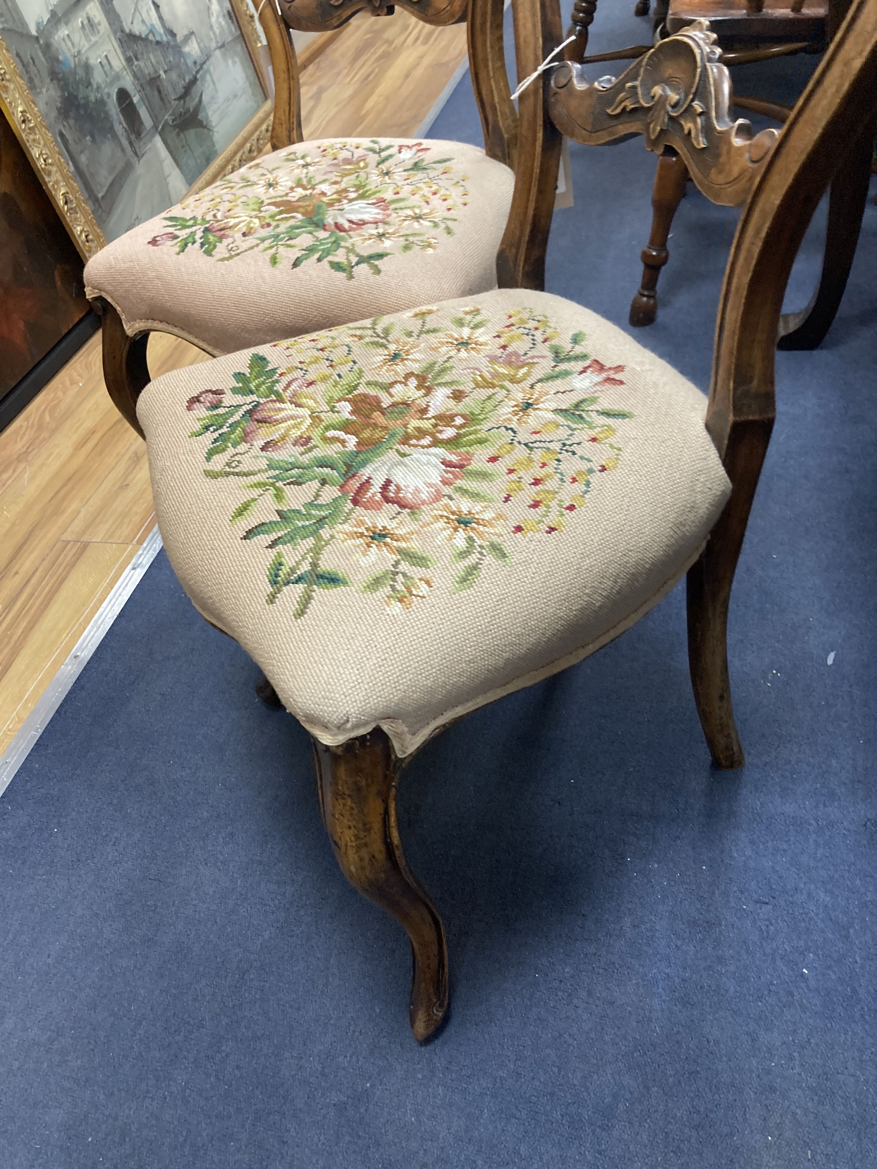 A pair of Victorian walnut side chairs